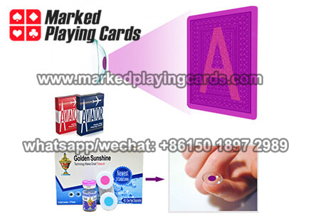 marked playing cards with contact lenses